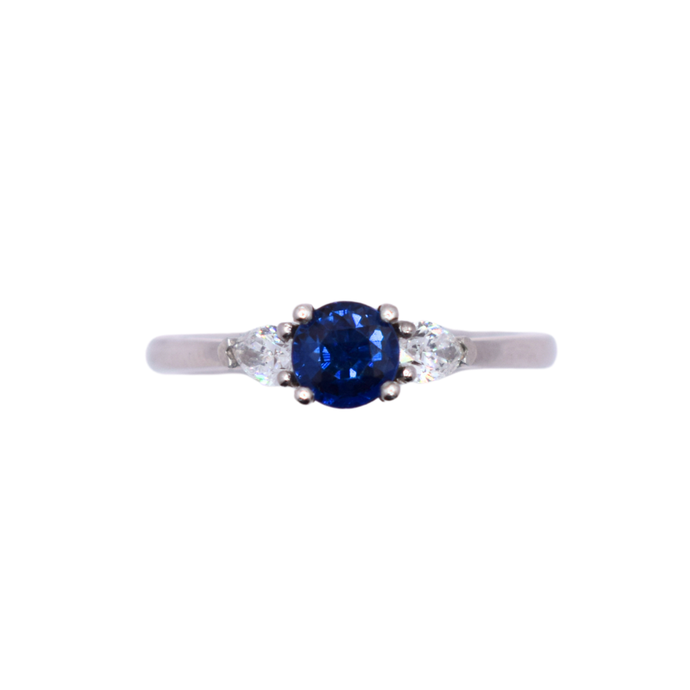 Platinum Round Sapphire And Pear Diamond Ring