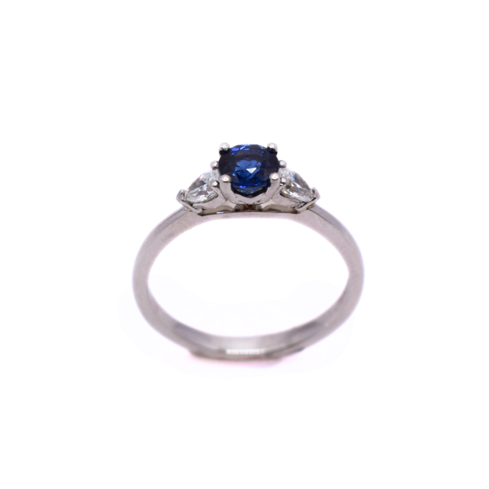 Platinum Round Sapphire And Pear Diamond Ring